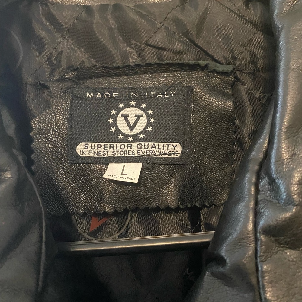 100 percent Italian leather bomber coat quilted interior.Pockets inside.